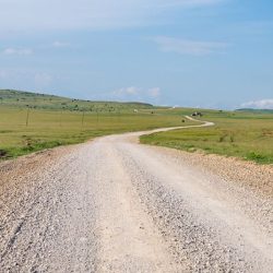 When a paved road intersects an unpaved road